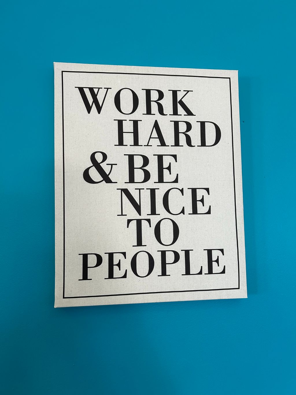 A poster of our mantra: work hard and be nice to people